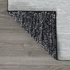 Sealskin Badmat Speckles Zwart 50x80 Cm -InterieurKunst Verkoopwinkel 123 11846